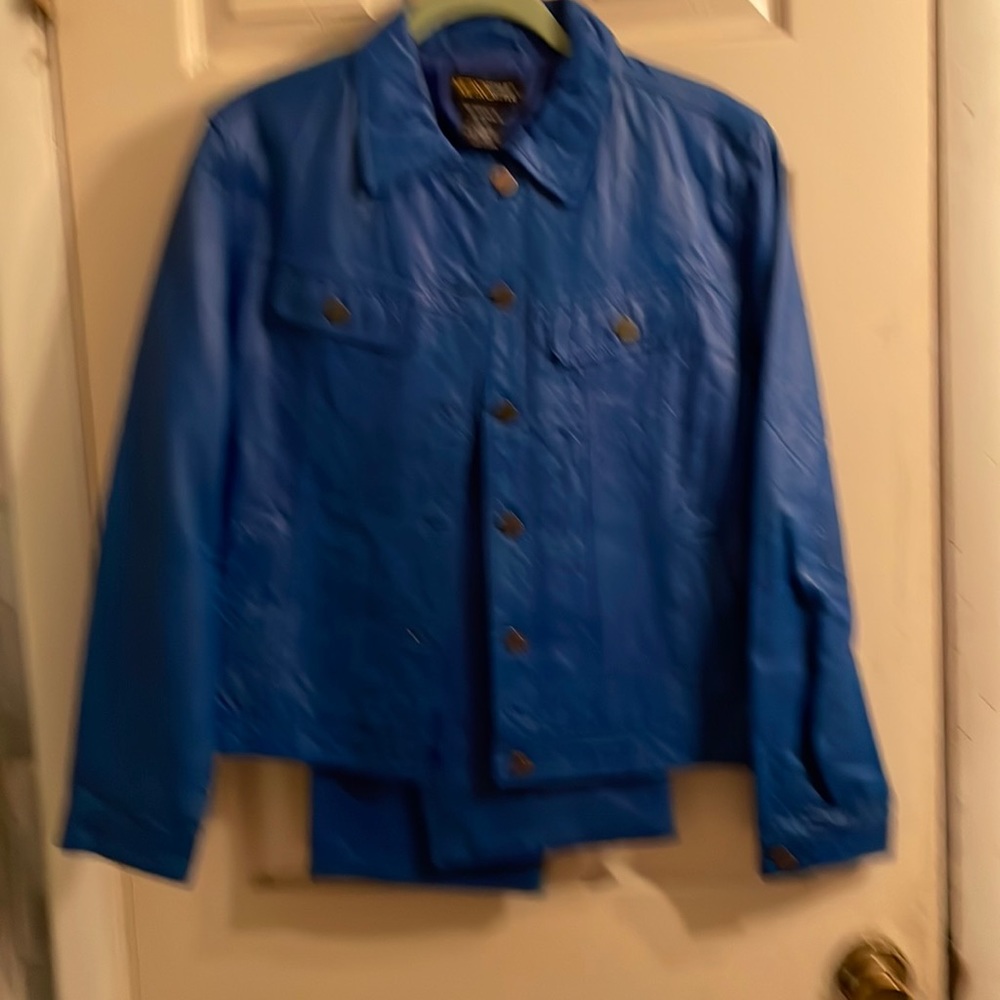 Genuine leather blue 2pc jacket size 12 pant size 14p worn in great condition